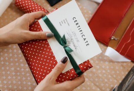 Certifications - Close-Up Shot of a Person Holding a Present
