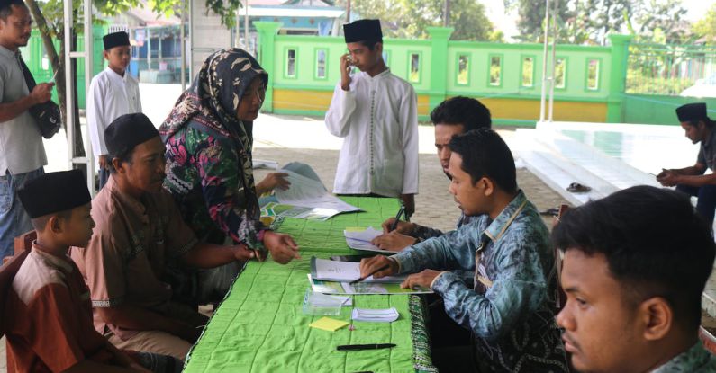 Legitimacy - People at Desk during Election