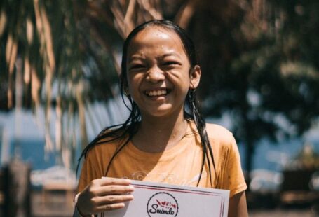 Certification - Girl Holding A Certificate