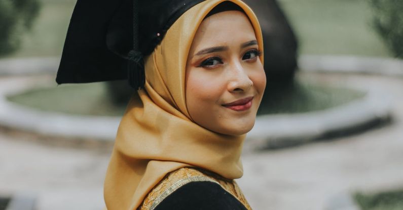 Degrees - Woman Wearing Black Square Academic Cap