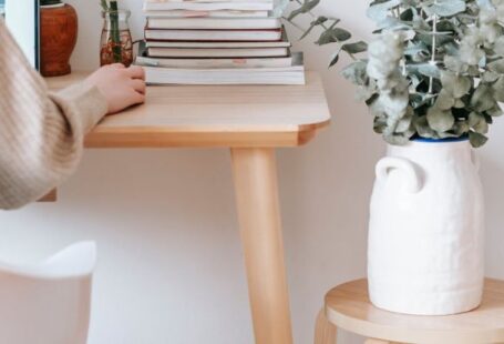 Online Degree - Anonymous woman working on laptop in room
