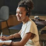 Writing Centers - Woman Working as a Call Center Agent