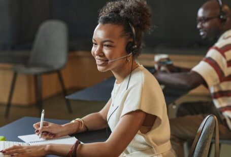 Writing Centers - Woman Working as a Call Center Agent