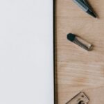 Education Degree - Notepad and school supplies on table