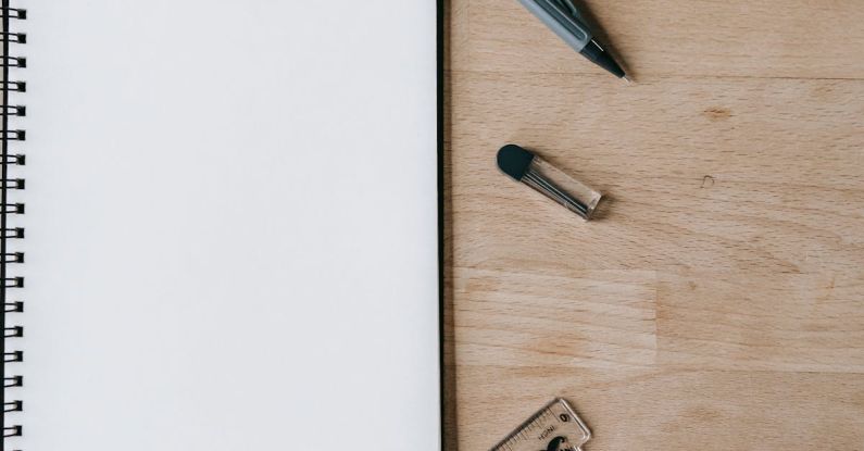 Education Degree - Notepad and school supplies on table