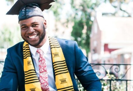 Degrees - Photo of Man Wearing Graduation Cap