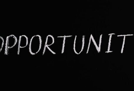 Job Opportunities - Opportunity Lettering Text on Black Background