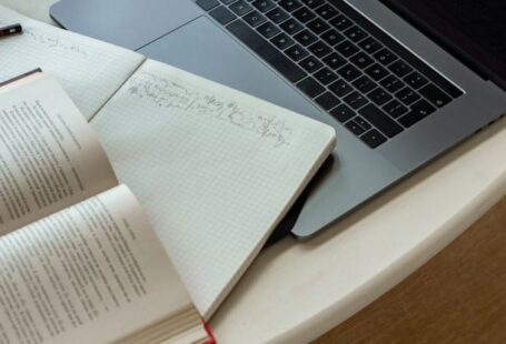 Email Etiquette - Macbook Pro on White Table