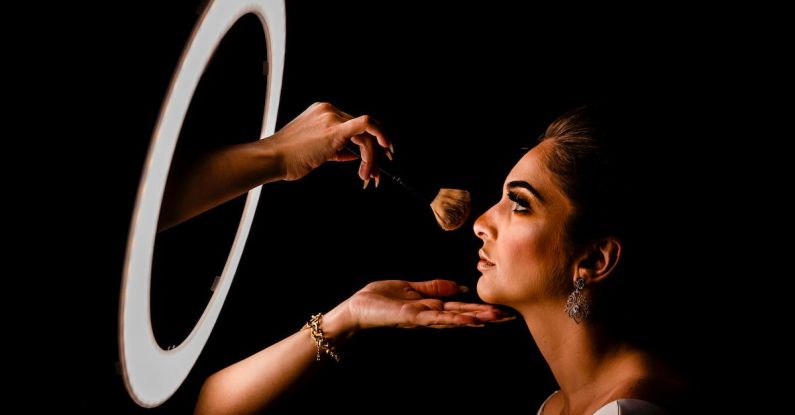 MBA - Woman Having Her Makeup Done in Front of a Ring Light 