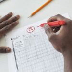 Grading - Person Checking Test Papers